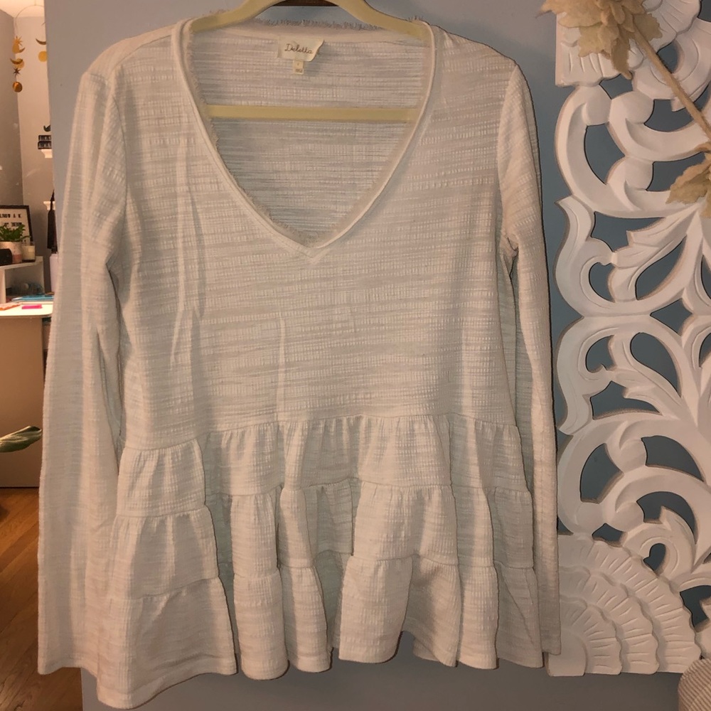 White ruffled, long sleeve blouse
